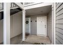 Exterior doorway with unit numbers and storm door with wreath at 101 Fair Haven Se Way, Smyrna, GA 30080