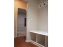 Mudroom featuring built-in bench, storage cubbies, and coat hooks for organized entry at 651 Deer Springs Way, Loganville, GA 30052