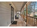 Inviting outdoor porch area with seating, perfect for enjoying peaceful moments at 4352 Treeline Way, Douglasville, GA 30135