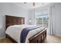 Comfortable bedroom featuring a large bed, natural light, and serene, neutral decor at 10 Perimeter Summit Ne Blvd # 4243, Atlanta, GA 30319