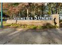 Stone sign with 'Perimeter Summit' lettering surrounded by autumn trees, enhancing curb appeal at 10 Perimeter Summit Ne Blvd # 4243, Atlanta, GA 30319