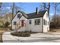 Eye-catching home featuring a modern exterior with a well-maintained yard and stylish walkway at 1870 Avon Sw Ave, Atlanta, GA 30311