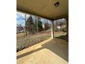 View of the backyard from under the covered back porch at 4373 Trake Way, Ellenwood, GA 30294