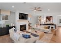 Bright living room with fireplace, hardwood floors, and stylish furniture at 6095 Marigold Way, Atlanta, GA 30349