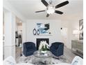 This living room boasts a cozy fireplace, stylish seating, and an open layout perfect for entertaining guests at 1622 Aiden Way # 62, Conyers, GA 30013