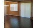 Living room with dark hardwood floors and a large window at 2303 Pine Tree Trl, Atlanta, GA 30349