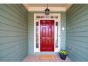 Close up of a front door with sidelights at 2460 Millwater Crossing Xing, Dacula, GA 30019