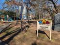 A lovely local park with mature trees, playground and park sign at 307 Adair St # 7-E, Decatur, GA 30030