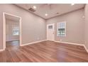 Inviting living room showcasing hardwood floors and neutral paint, ready for your personal touch at 7880 Rivertown Rd, Atlanta, GA 30213