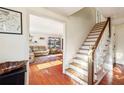 Inviting home foyer featuring gleaming hardwood floors and staircase at 5352 Waterford Dr, Dunwoody, GA 30338