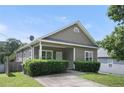 Attractive home with a well-kept lawn, simple landscaping, and a cozy covered porch at 848 Capitol View Nw Ave, Atlanta, GA 30318