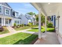 Inviting front yard featuring a landscaped garden and a view of neighboring homes at 648 Liella Se Park, Atlanta, GA 30312