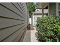 Side yard view, featuring a walkway to backyard at 404 Paperbark Ct, Acworth, GA 30102