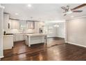 Open-concept kitchen with a center island, seamlessly flowing into the living area at 2695 Terratim Ln, Decatur, GA 30034
