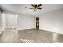 Spacious living room featuring hard surface floors and neutral wall colors at 2921 Russ Ln, Lithonia, GA 30058