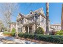 Charming two-story home with stone accents, shingle siding, and manicured landscaping at 3529 S Sherwood Se Rd, Smyrna, GA 30082