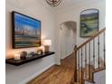Bright hallway features hardwood floors, neutral walls, and tasteful artwork at 3529 S Sherwood Se Rd, Smyrna, GA 30082