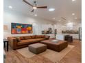 Open living space featuring hardwood floors, a comfortable seating area, and a modern kitchen at 3529 S Sherwood Se Rd, Smyrna, GA 30082