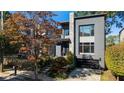 Contemporary two-story home with stone accents and a black garage door at 640 East Ne Ave, Atlanta, GA 30312