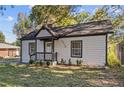 Adorable cottage-style home featuring a well-maintained front yard and inviting entrance at 2776 Grand Sw Ave, Atlanta, GA 30315