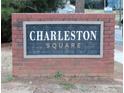 Charleston Square community sign on a brick base near a street at 5586 Kingsport Dr, Atlanta, GA 30342