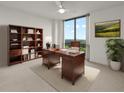 Inviting home office with large window, classic wood desk and bookcase, and ample natural light at 2870 Pharr Court South Nw # 2901, Atlanta, GA 30305
