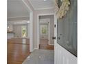 Welcoming entryway with marble tile floors and views of the kitchen and living spaces at 2542 Maclaren Cir, Dunwoody, GA 30360