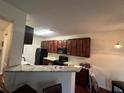 Efficient kitchen featuring granite countertops, modern appliances, and ample cabinet space at 2555 Flat Shoals Rd # 2006, Atlanta, GA 30349