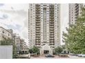 A full exterior shot of this high-rise building with multiple balconies and an inviting entrance at 795 Hammond Dr # 813, Sandy Springs, GA 30328