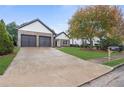 Inviting single-Gathering home featuring a long driveway and a two-car garage at 100 Jericho Dr, Covington, GA 30016