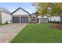 Lovely single-story home with a well-kept lawn and a two-car garage at 100 Jericho Dr, Covington, GA 30016