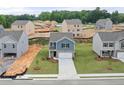 Aerial view of a neighborhood under construction with well-spaced homes and lush green spaces at 206 Oak View Ln, Dallas, GA 30157