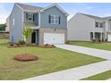 Charming two-story home with a well-manicured lawn and inviting curb appeal at 206 Oak View Ln, Dallas, GA 30157