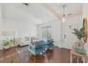 Inviting living room featuring hardwood floors, modern lighting, and comfortable seating at 807 Plaintain Dr, Woodstock, GA 30188