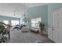 Bright living room with lots of natural light, neutral walls, and cozy seating at 2555 Flat Shoals Rd # 1705, Atlanta, GA 30349