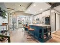 Modern kitchen featuring a center island with seating and stainless steel appliances at 890 Memorial Se Dr # 102, Atlanta, GA 30316