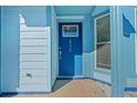 Close-up of a blue front door with decorative glass and house number at 836 Heritage Oaks Dr, Stone Mountain, GA 30088