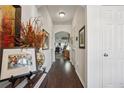 Inviting entryway featuring a dark wood floor and bright white walls at 1914 Lakeshore Overlook Nw Cir, Kennesaw, GA 30152