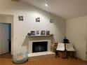 Living room features a white brick fireplace and modern wall art at 330 Warm Springs Cir, Roswell, GA 30075