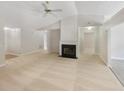 Spacious living room with fireplace and vaulted ceiling, freshly painted at 2545 Lakemeadow Ln, Grayson, GA 30017
