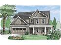 Charming two-story home with a welcoming front porch and attached garage at 1211 Cherry Bark Ct, Loganville, GA 30052