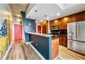 Modern kitchen with stainless steel appliances and granite countertops at 860 Peachtree St # 811, Atlanta, GA 30308