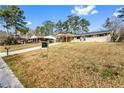 Spacious, ranch-style home with a covered carport and inviting curb appeal at 1646 Flicker Rd, Jonesboro, GA 30238