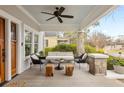 Relaxing covered porch offers seating and a ceiling fan, perfect for enjoying the outdoors at 205 Mead Rd, Decatur, GA 30030