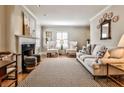 Elegant living room features a fireplace, hardwood floors, and bright natural light at 807 Longwood Dr, Atlanta, GA 30305