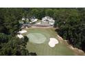 Picturesque view of the home and the golf course at 583 Carl Sanders Dr, Acworth, GA 30101