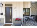 Cozy front porch featuring comfortable seating and decorative accents at 593 Formwalt Sw St, Atlanta, GA 30312