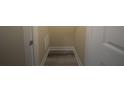 Walk-in closet space featuring hardwood flooring and door for storage at 951 Plaza Park Walk # 50, Kennesaw, GA 30144