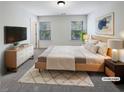 Tranquil, virtually staged bedroom with a comfy bed, neutral tones, and lots of light at 807 Ambient Sw Way, Atlanta, GA 30331