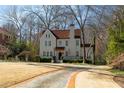 Elegant two-story home with a red tile roof, classic design, and inviting front yard at 1122 Springdale Ne Rd, Atlanta, GA 30306